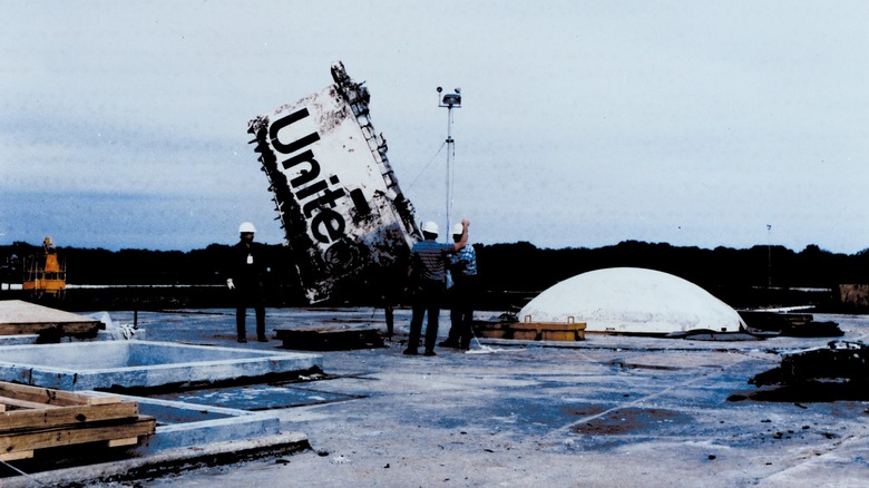 challenger remains technicians outside