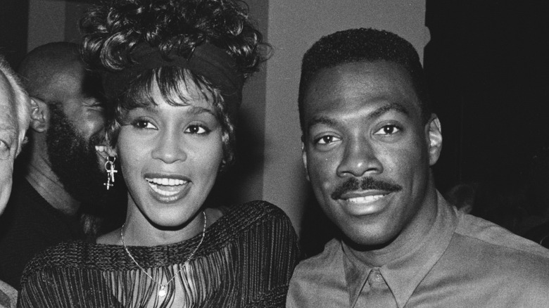 whitney houston smiling with eddie murphy