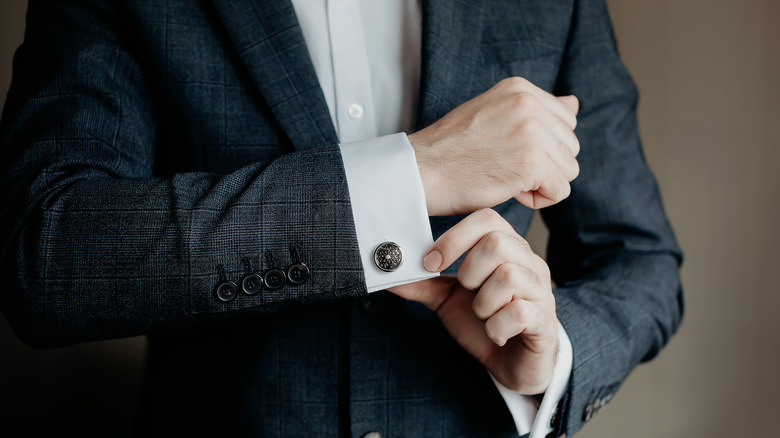 man wearing cufflinks