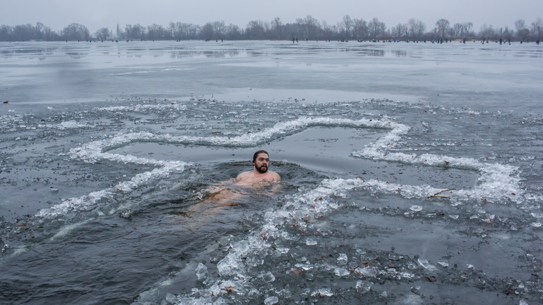 Ukrainian man bathing in ice water, Epiphany