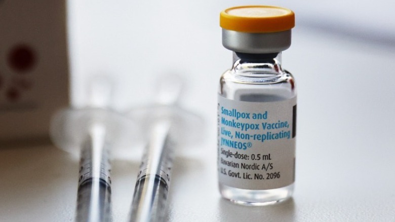 A vial of Jynneos monkeypox vaccine and two syringes