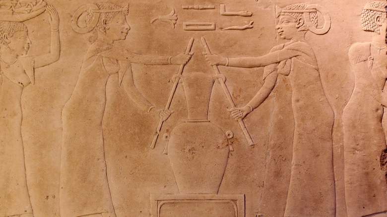 Ancient Egyptian carving of perfume preparation.