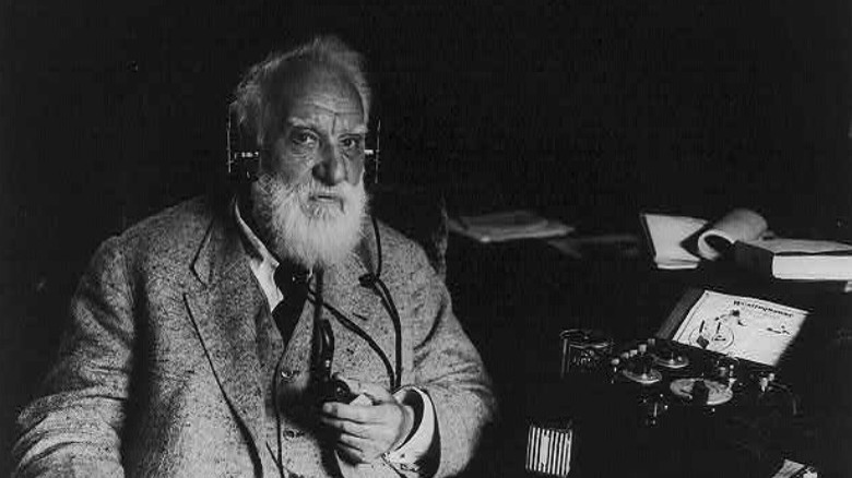 Alexander Graham Bell listening to radio