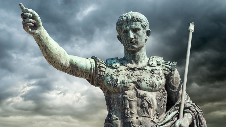 statue of Caesar Octavian under cloudy sky