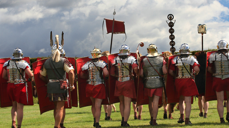 recreation of Roman soldiers in battle