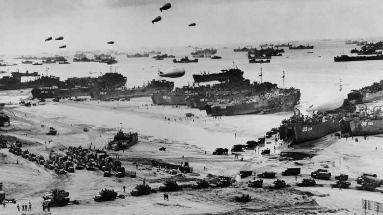 Barrage balloons fly over D-Day