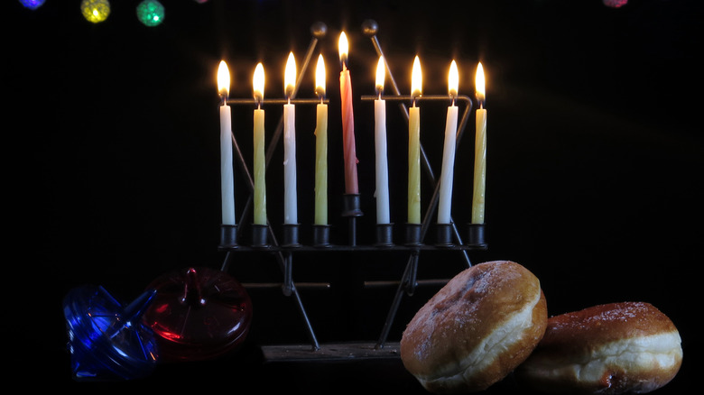 hanukkah menorah and sufganiyot