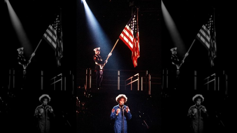 Whitney Houston performing "The Star-Spangled Banner" during the HBO-televised concert "Welcome Home Heroes with Whitney Houston" honoring the troops, who took part in Operation Desert Storm, their families, and military and government dignitaries