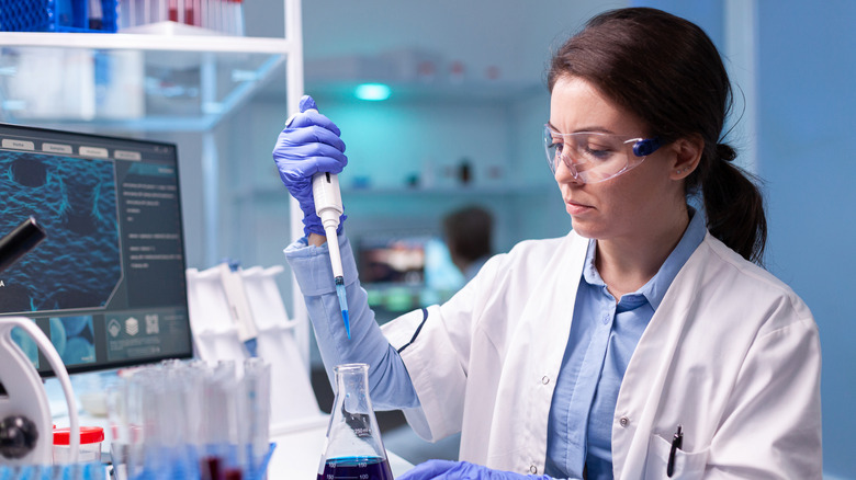 chemist in white lab coat