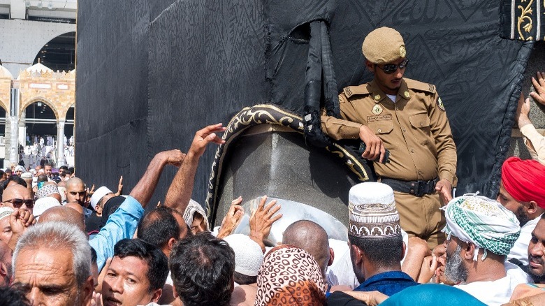 Muslims touching Black Stone