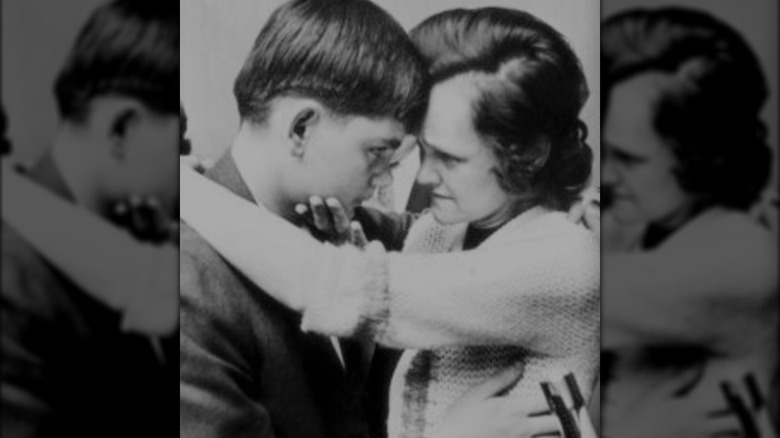 Gertrude Baniszewski with son John after trial