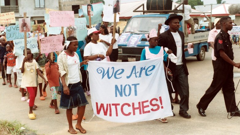 children protesters holding sign 