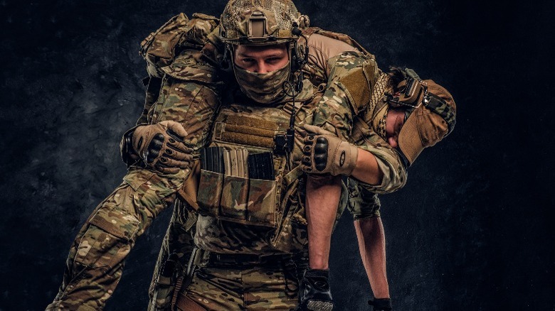 soldier carrying soldier