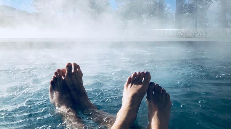 Feet in bubbling hot tub