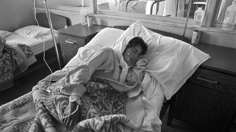 Kurdish woman in hospital bed