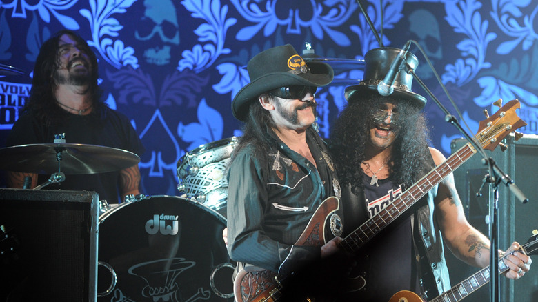 Dave Grohl, Lemmy Kilmister, and Slash performing in 2010