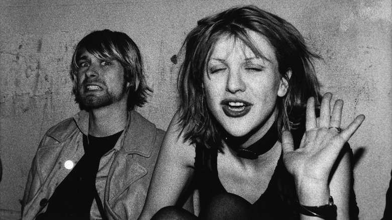 Kurt Cobain and Courtney Love in 1992 making faces