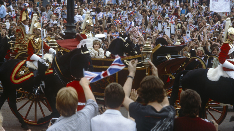 Crowds greet Prince Charles and Princess Diana