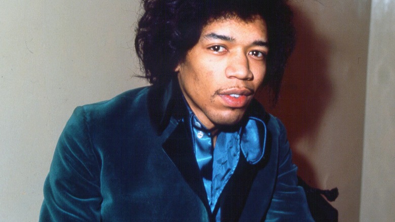 Jimi Hendrix staring at camera