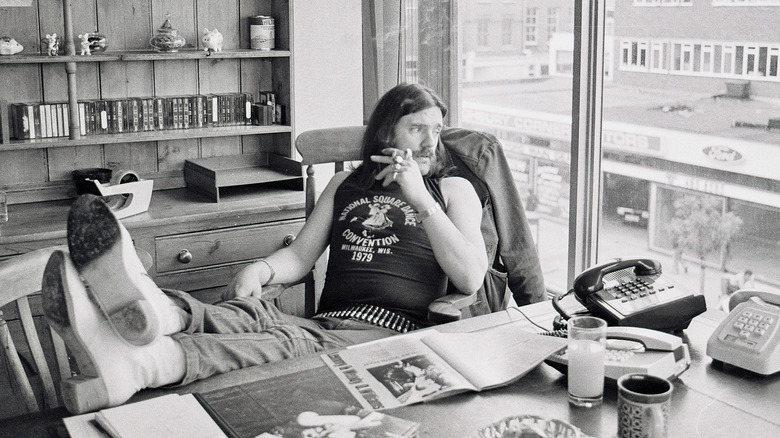 Lemmy Kilmister at a desk