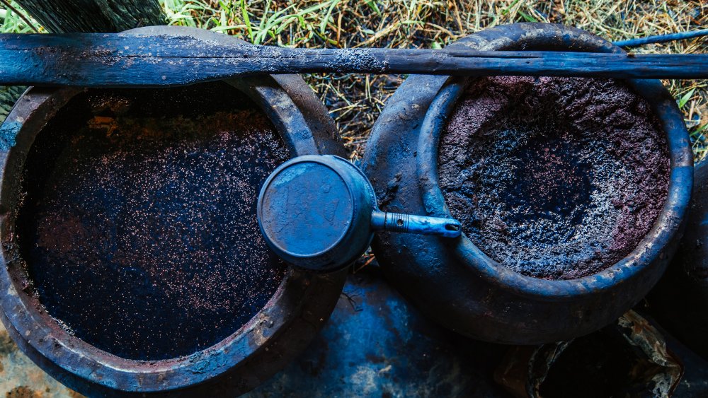 Powdered indigo dye dispels the jhinjhar horseman