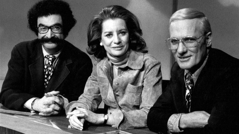 Gene Shalit, Barbara Walters, and Frank McGee pose