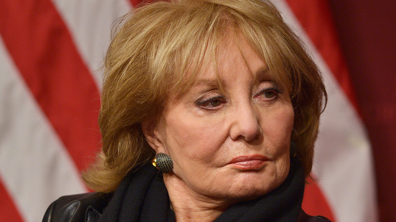 Barbara Walters looks to her left