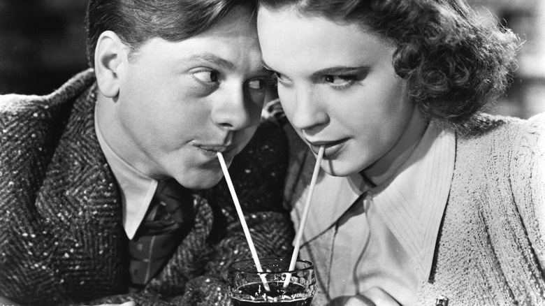 Mickey Rooney Judy Garland sharing a soda