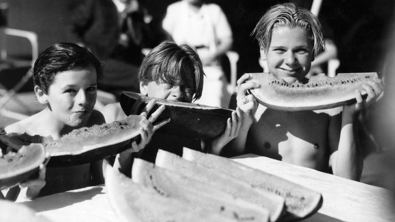 young Mickey Rooney eating watermelon