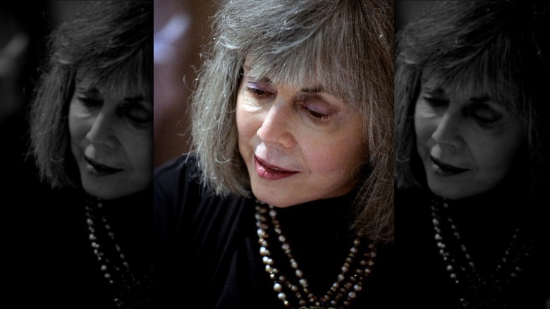 Anne Rice with downcast eyes