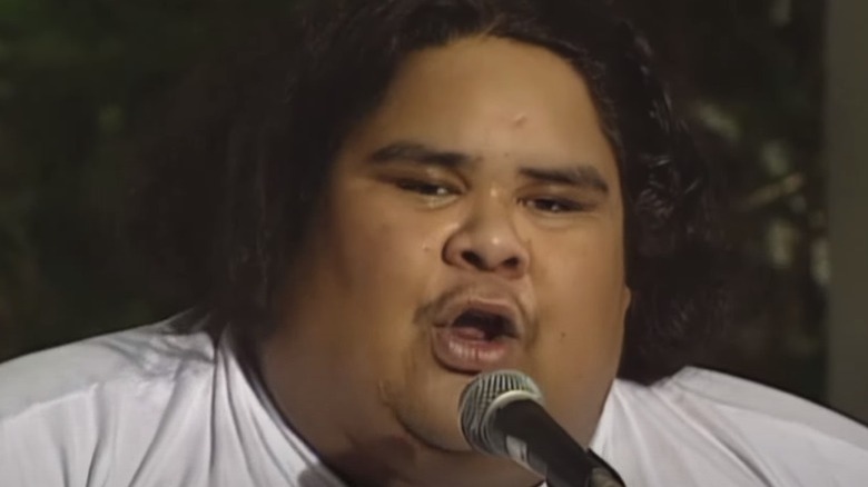 Israel Kamakawiwo'ole white shirt mic singing 