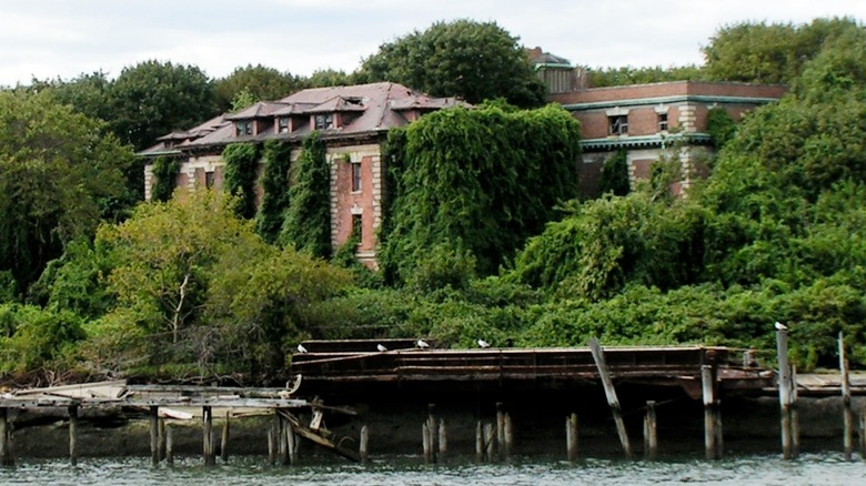 The abandoned and overgrown Riverside Hospital on North Brother Island