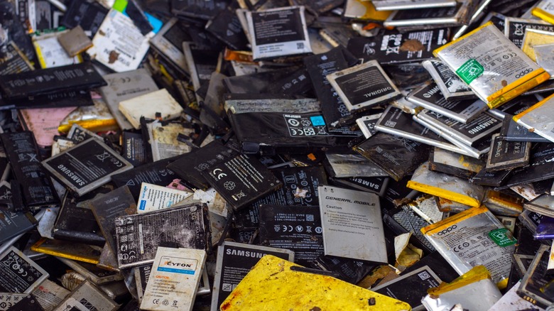 Heap of discarded cell phone batteries