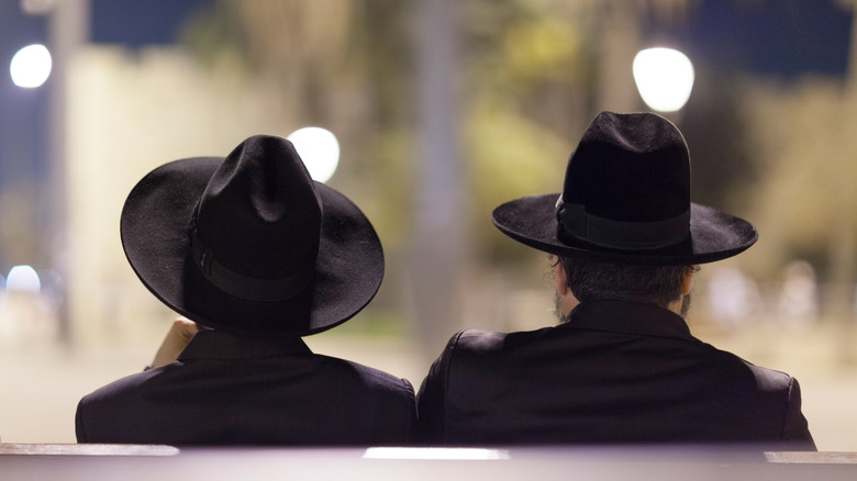 Israeli Jewish men sitting on bench