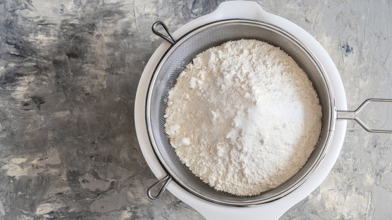 white flour in white bowl