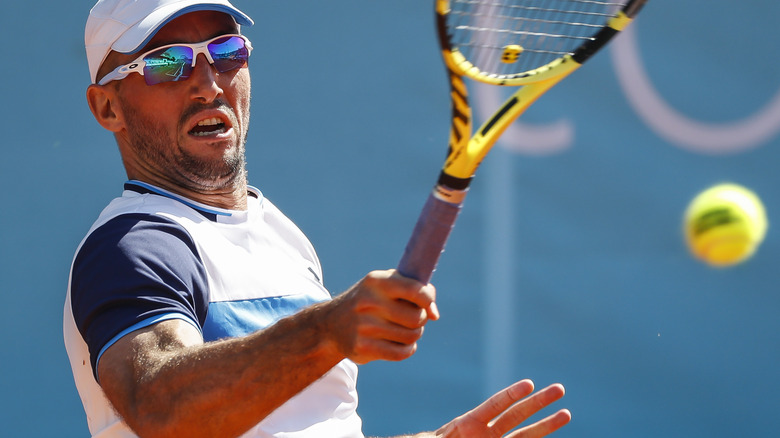 Viktor Troicki playing tennis