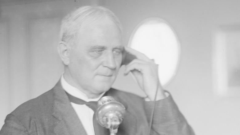 Champ Clark speaking on antique phone