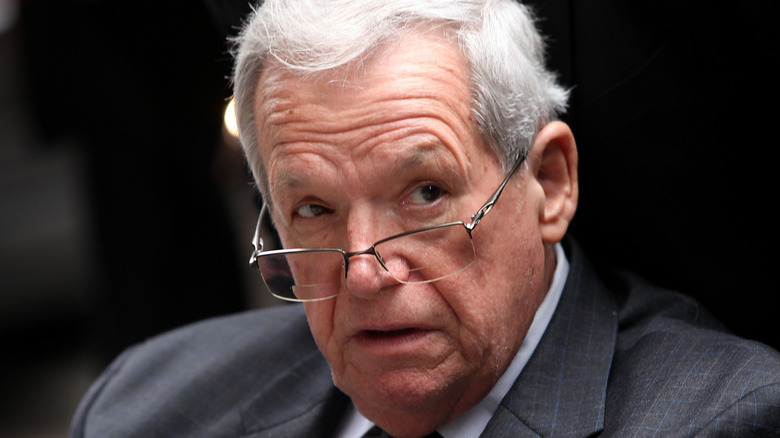 Dennis Hastert looking up glasses