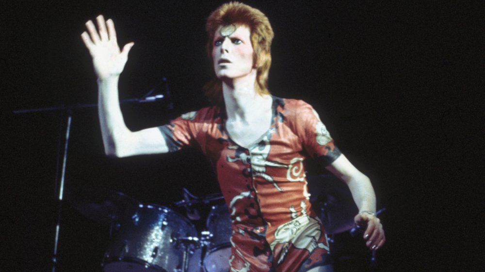 David Bowie wearing an outfit designed by Kansai Yamamoto