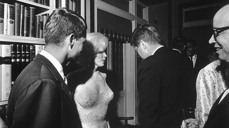 Marilyn Monroe with John and Bobby Kennedy