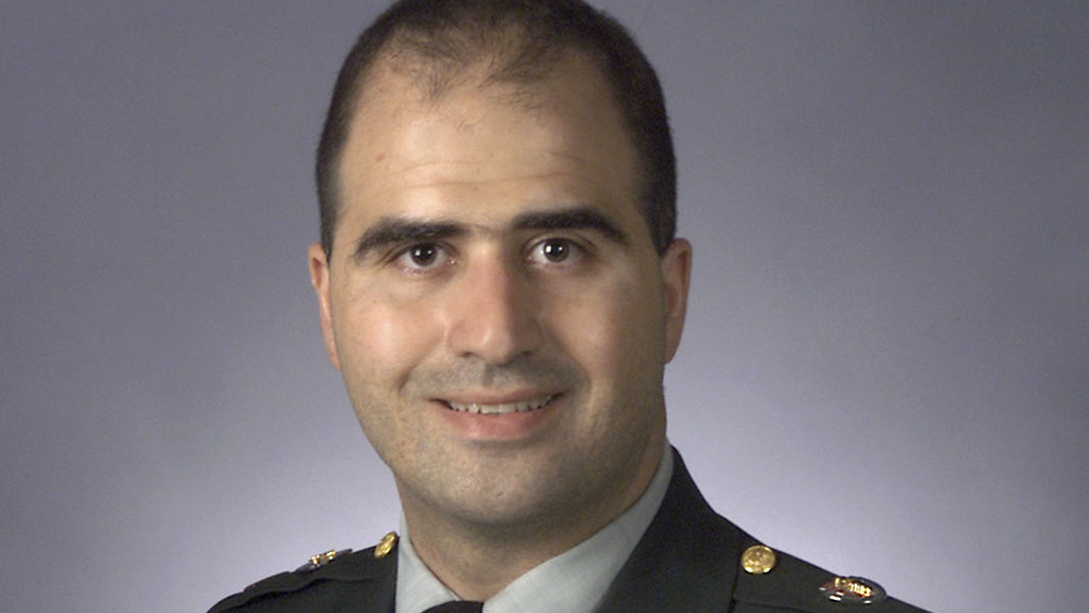 Nidal Malik Hasan smiling