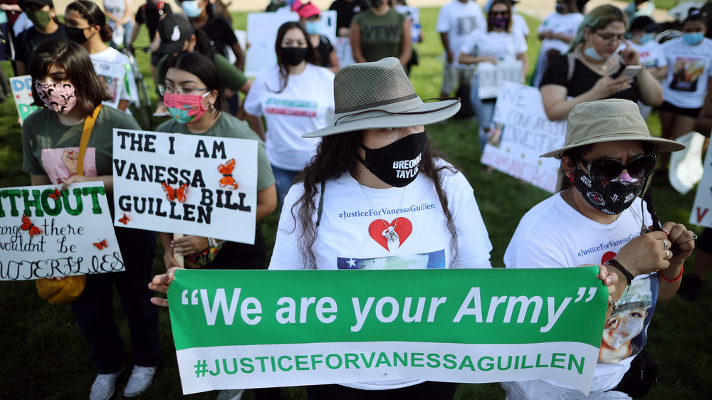 Fort Hood protestors with signs