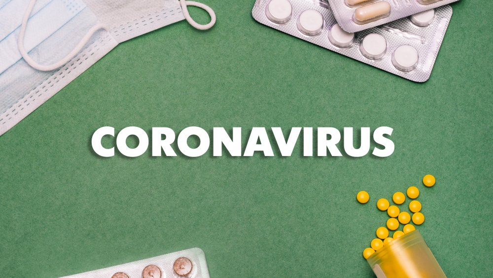 The word "coronavirus" surrounded by masks and pills