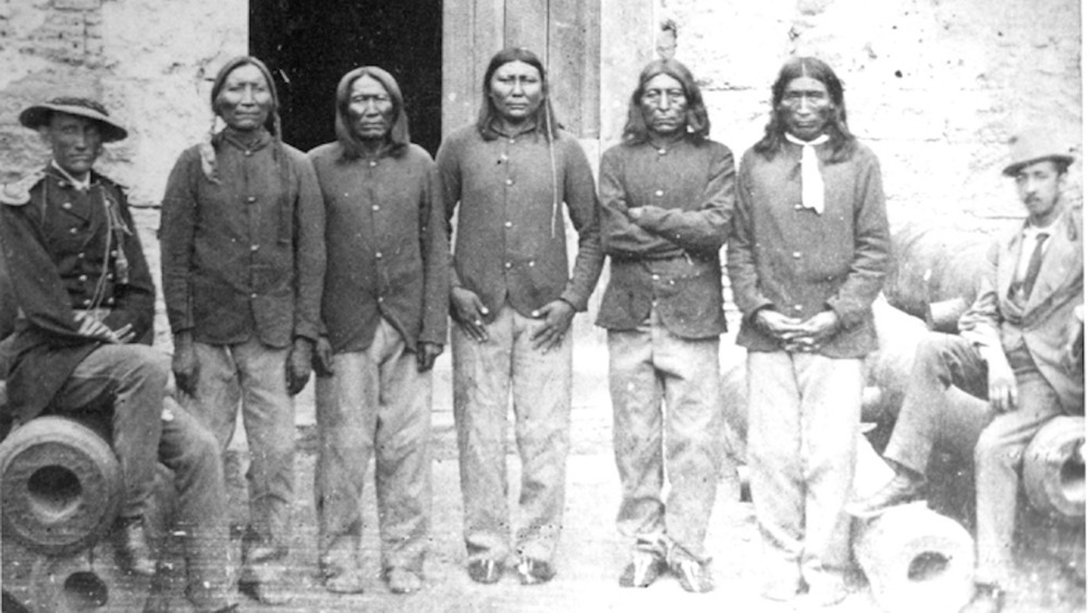 Pratt and Native prisoners standing