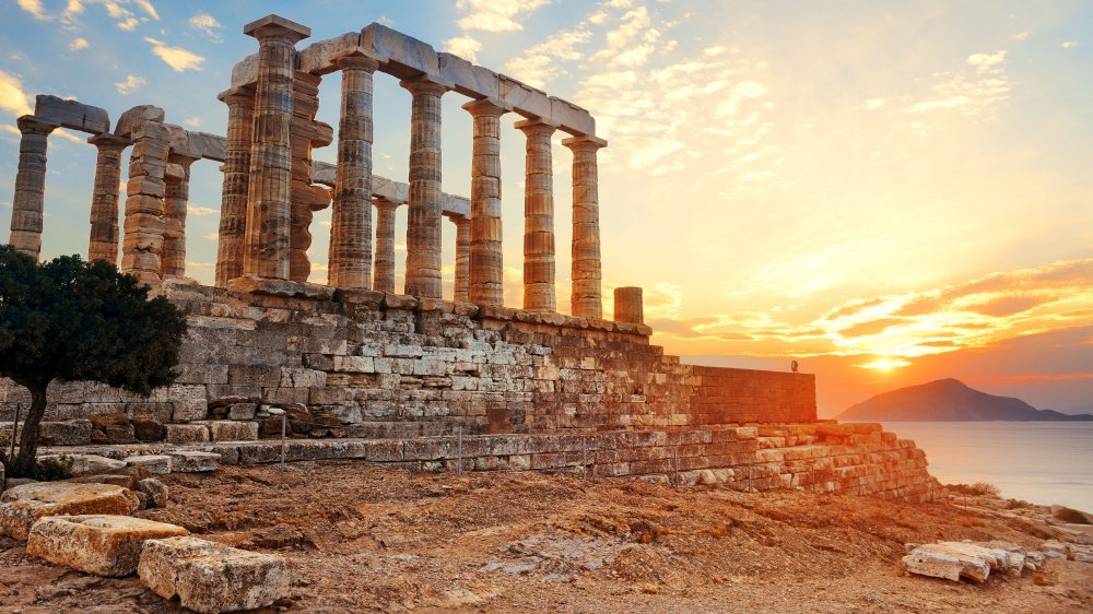 Sunset at Temple of Poseidon near Athens, Greece.