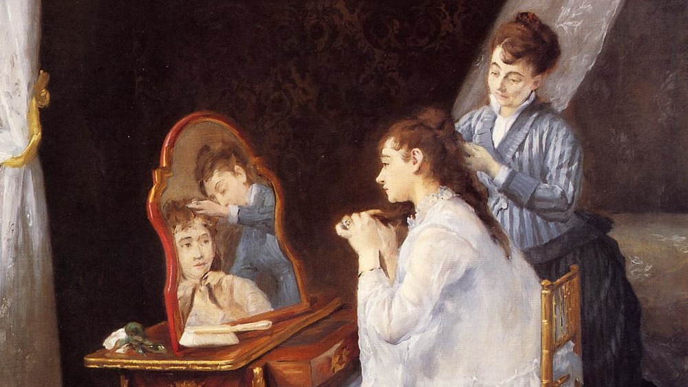 Portrait of Victorian woman at her mirror