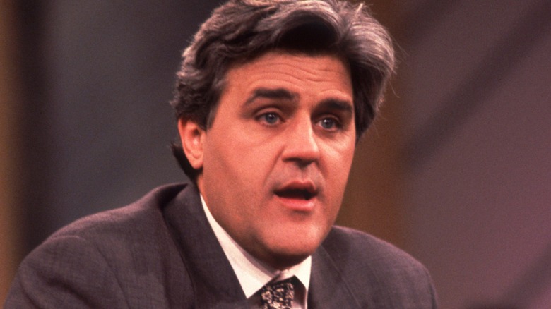 Jay Leno wearing suit and talking on the set of The Oprah Winfrey Show