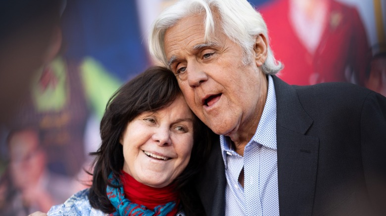 Jay Leno embracing Mavis Leno at Unfrosted premiere