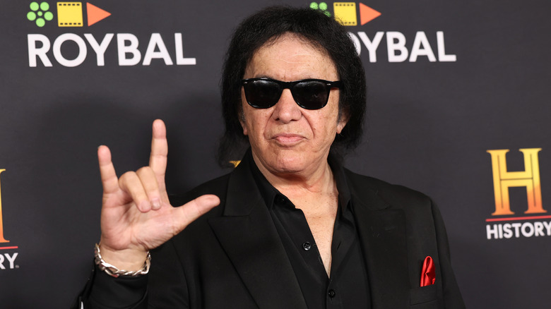 Gene Simmons holding up the devil horns in Los Angeles in 2024