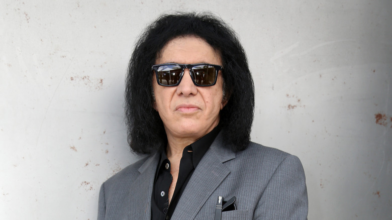 Gene Simmons wearing sunglasses and posing for a photo in Hollywood in 2014